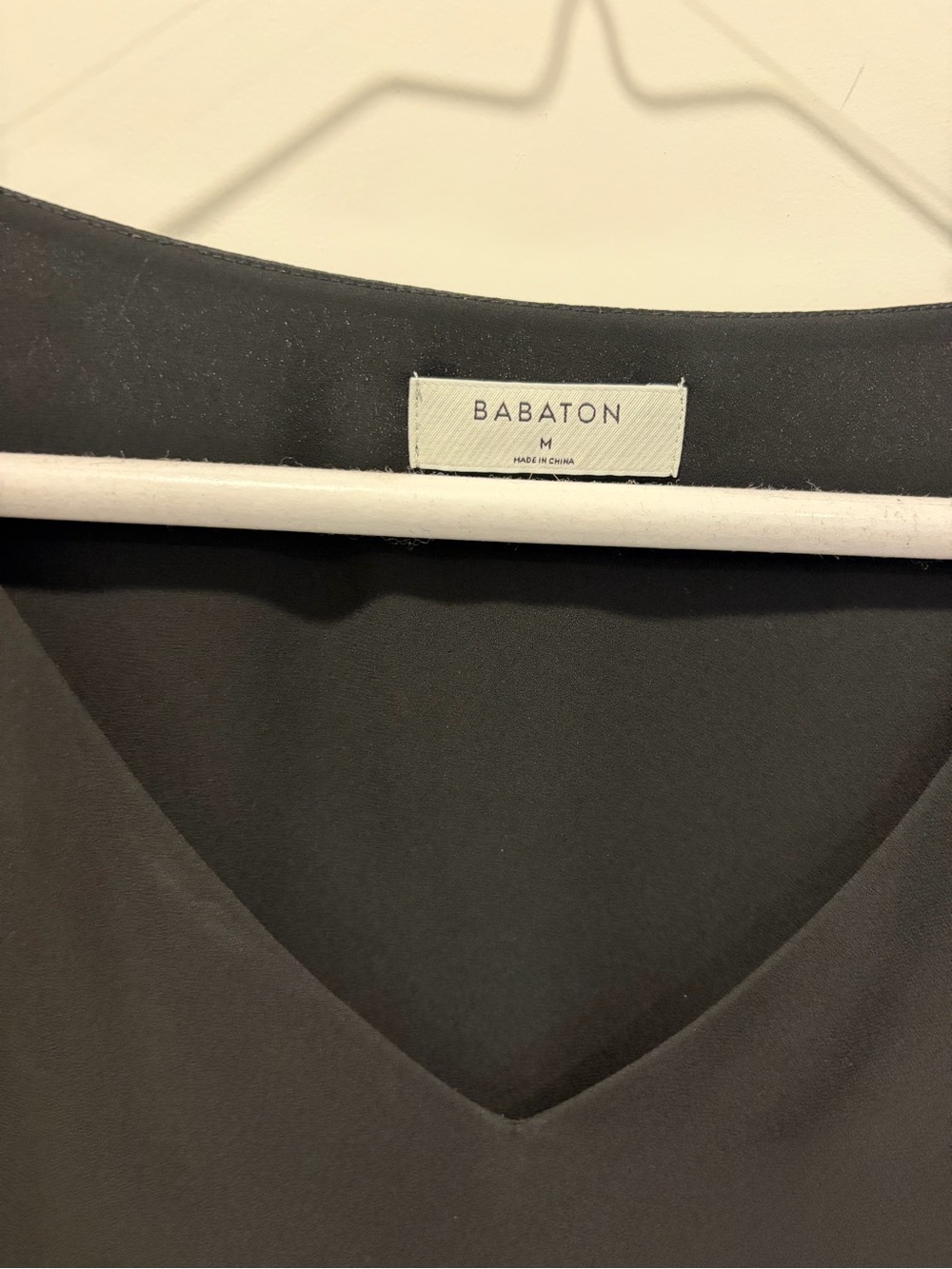 Babaton Black V-Neck Blouse